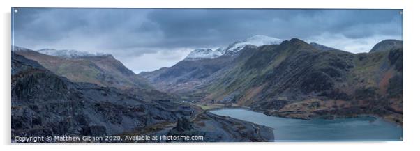 Beautiful landscape image of Dinorwig Slate Mine and snowcapped Snowdon mountain in background during Winter in Snowdonia with Llyn Peris in foreground Acrylic by Matthew Gibson