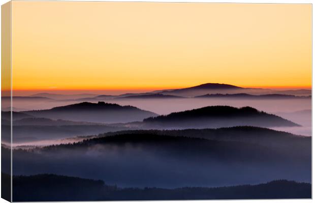 Hills in the Mist at Sunrise Canvas Print by Arterra 