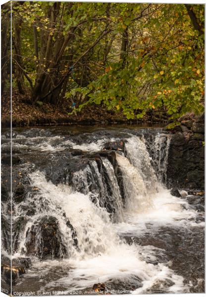 Waterfall Under Autumn Colours Canvas Print by Ken Hunter
