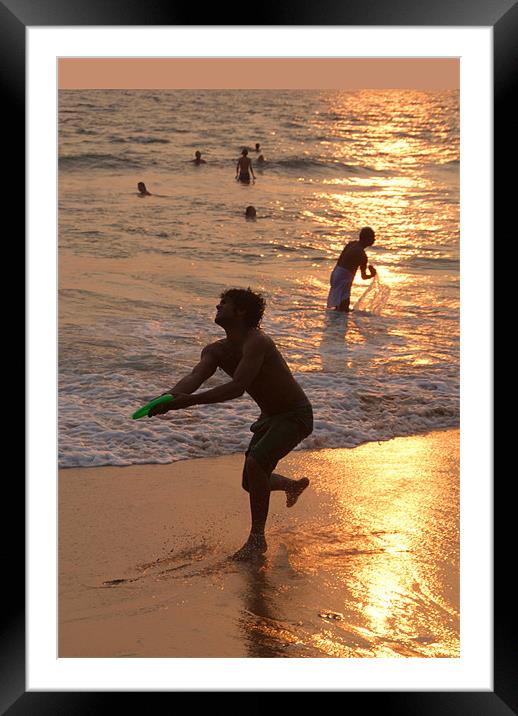 Frisbee Thrower on Varkala Beach at Sunset Framed Mounted Print by Serena Bowles