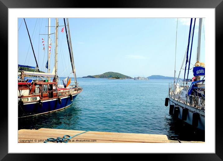 Skiathos bay taken from the marina at Skiathos tow Framed Mounted Print by john hill