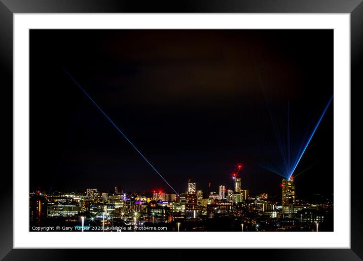 Leeds skyline with Leeds Laser Light Night Framed Mounted Print by Gary Turner