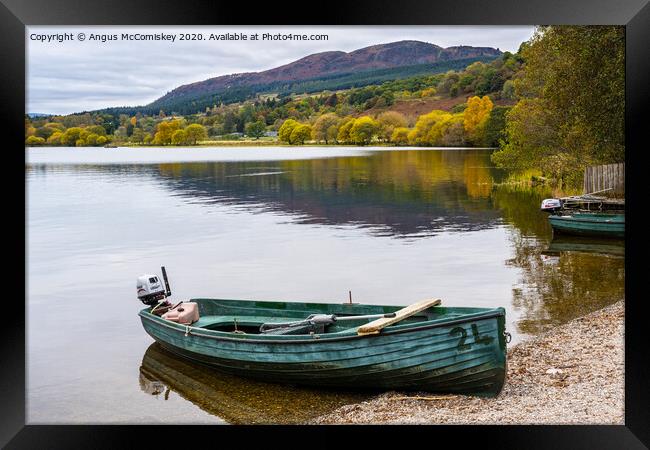 Beached boat on Lake of Menteith Framed Print by Angus McComiskey