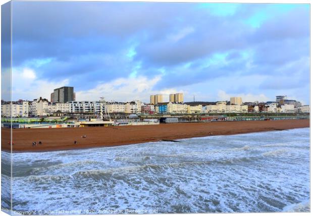 Brighton beach from the pier Canvas Print by Julie Tattersfield