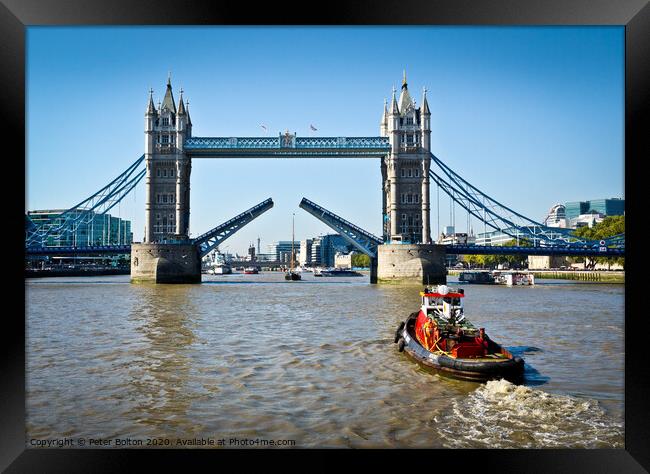 Tower Bridge on River Thames in London opens for a Framed Print by Peter Bolton