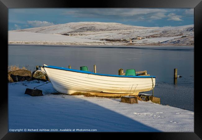 Shetland small white fishing boat in snow at Tingw Framed Print by Richard Ashbee