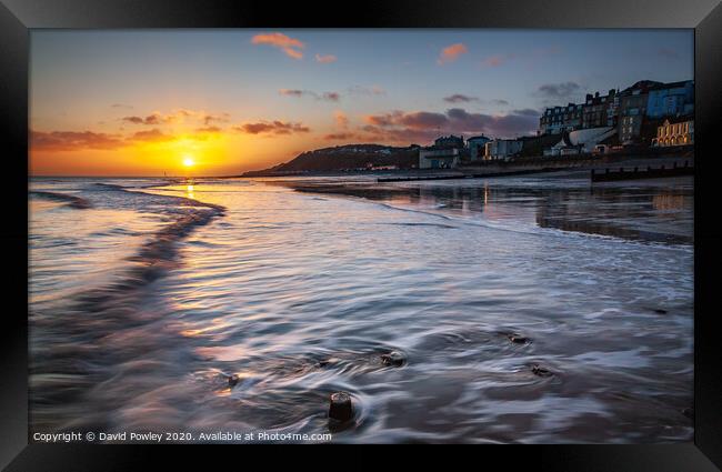 Sunrise over Cromer beach Norfolk Framed Print by David Powley