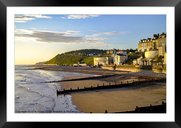 A view across Cromer beach at sunrise from the pier Framed Mounted Print by Chris Yaxley