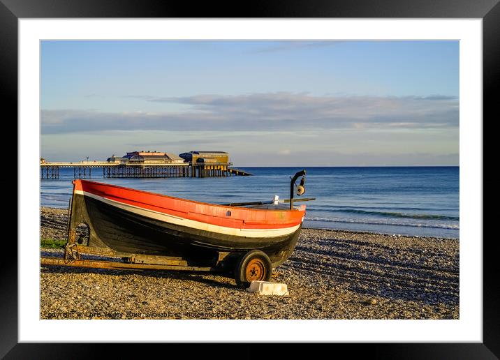 Crab fishing boat at sunrise on Cromer beach, Norfolk Framed Mounted Print by Chris Yaxley