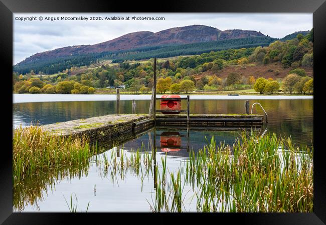 Landing stage on Lake of Menteith Framed Print by Angus McComiskey