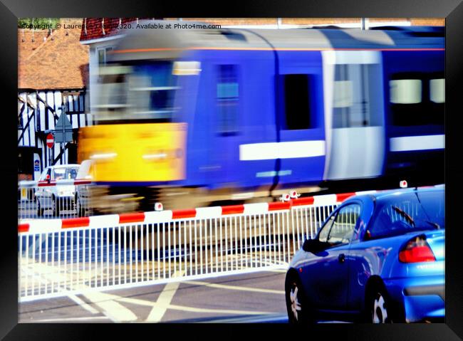 Fast Train on Level Crossing Framed Print by Laurence Tobin