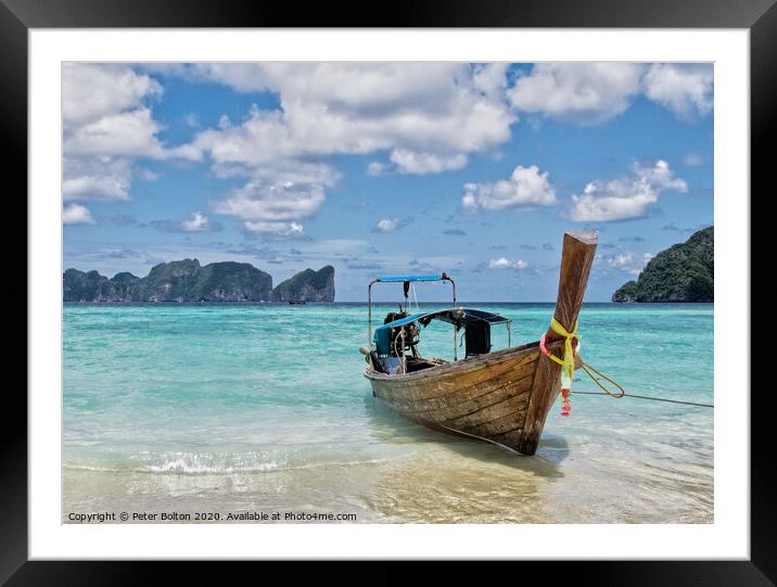 Long tail boat on the beach at Ko Phi Phi Leh, Krabi Province, Thailand. Framed Mounted Print by Peter Bolton