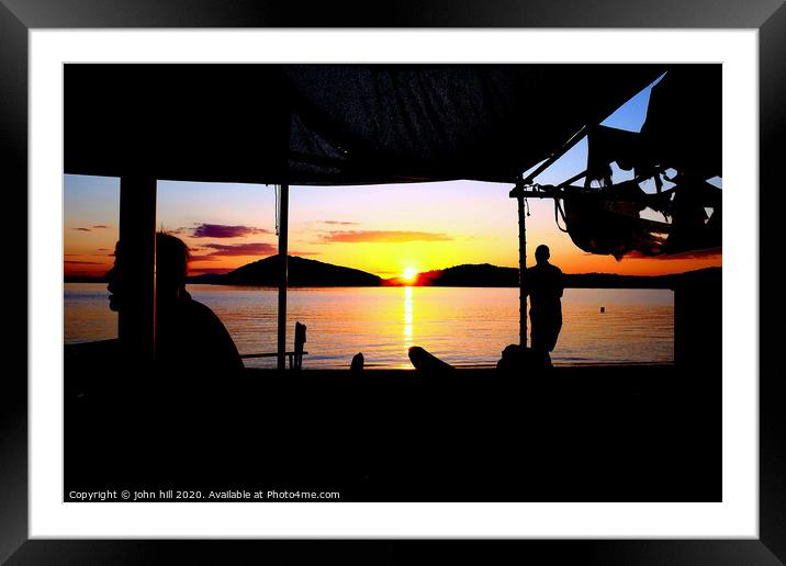 Sunset at beach bar on Tsougrias island in Greece. Framed Mounted Print by john hill