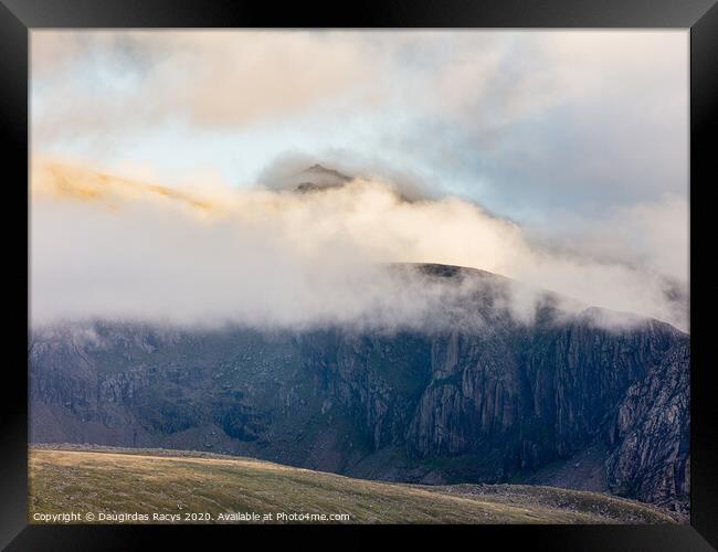 Snowdon in the clouds Framed Print by Daugirdas Racys