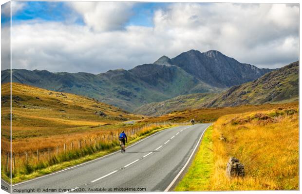 Cyclist Snowdonia Wales Canvas Print by Adrian Evans