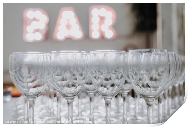 Empty glasses on a bar counter for drinking alcohol. Print by Joaquin Corbalan