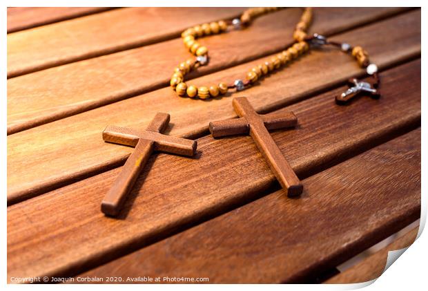 Rosary with wooden beads and Christian cross. Print by Joaquin Corbalan