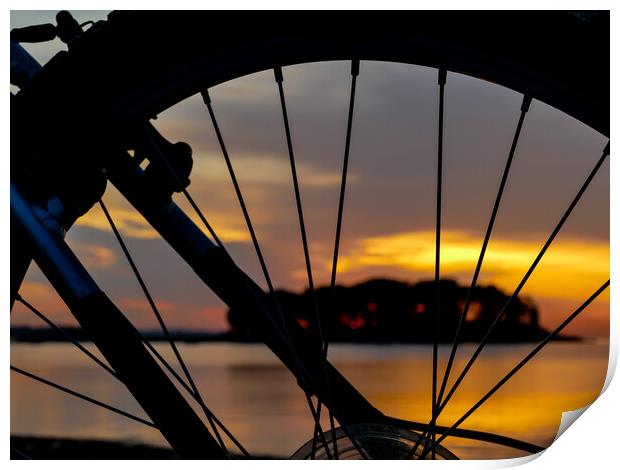 Wheel silhouette from bike and sunrise light  Print by Miro V