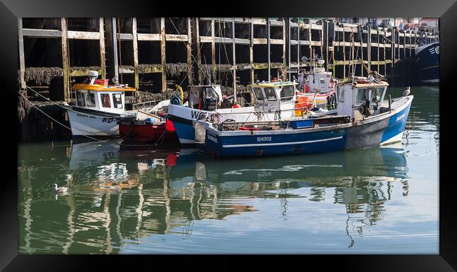 Cluster of fishing boats in Scarborough harbour Framed Print by Jason Wells