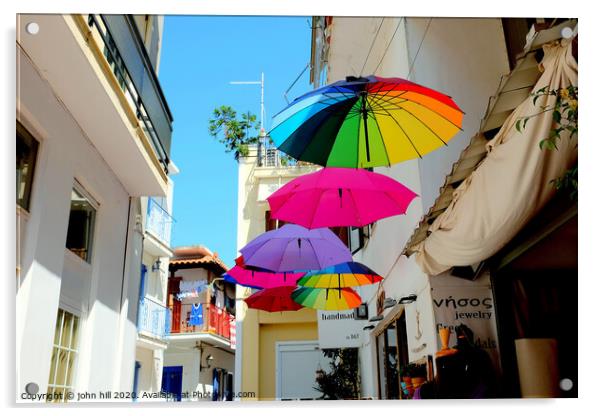 Colorful Parasols hanging in street at Skiathos Town in Greece.  Acrylic by john hill