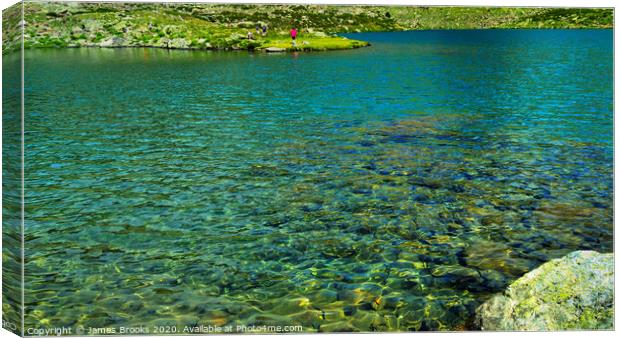 Crystal clear water Lacs de Tristaina Canvas Print by James Brooks