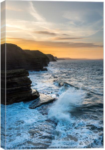 Waves breaking at Filey Brigg, North Yorkshire Canvas Print by Andrew Kearton