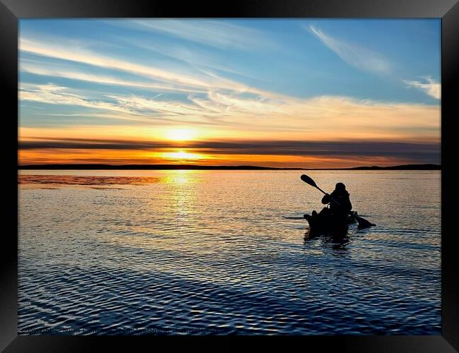 Kayaking under an Orkney sunset  Framed Print by Myles Campbell