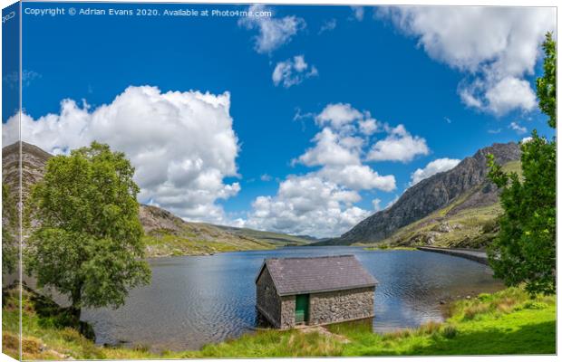 Lake Ogwen and Tryfan Mountain Wales Canvas Print by Adrian Evans