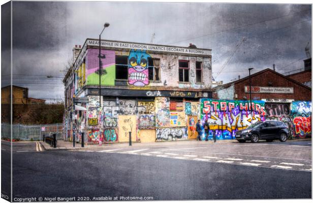 Meanwhile In East London, Lunatics Decorate A Building...  Canvas Print by Nigel Bangert