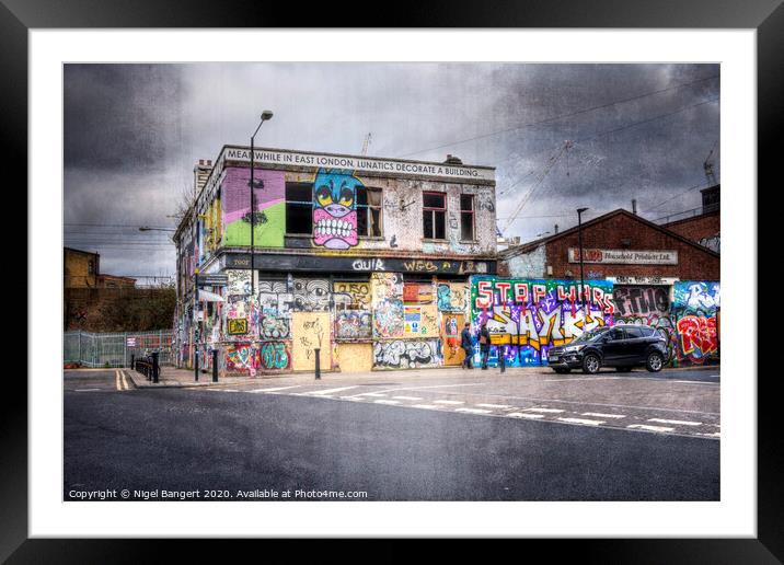 Meanwhile In East London, Lunatics Decorate A Building...  Framed Mounted Print by Nigel Bangert