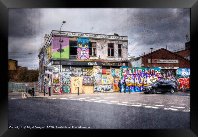 Meanwhile In East London, Lunatics Decorate A Building...  Framed Print by Nigel Bangert