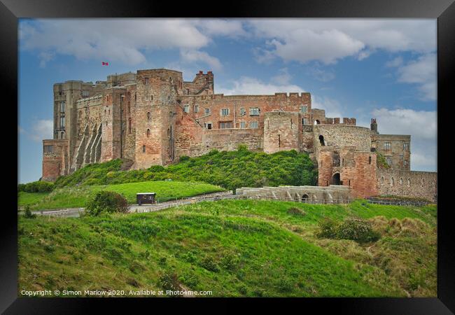 Bamburgh Castle in Northumberland Framed Print by Simon Marlow