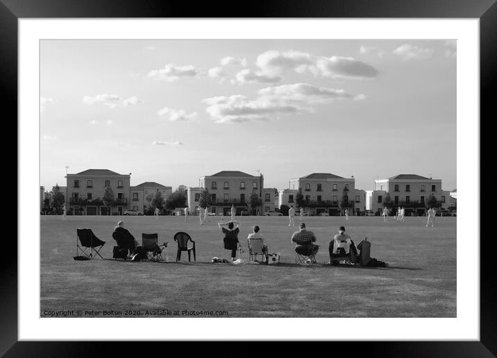 'Leather on Willow'. Cricket on the green at The Garrison, Shoeburyness, Essex, UK. Framed Mounted Print by Peter Bolton