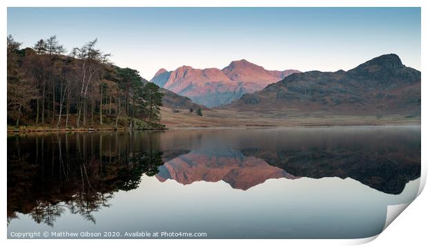 Beautiful Autumn Fall colorful sunrise over Blea Tarn in the Lake District with High Raise and The Langdales in the distance Print by Matthew Gibson
