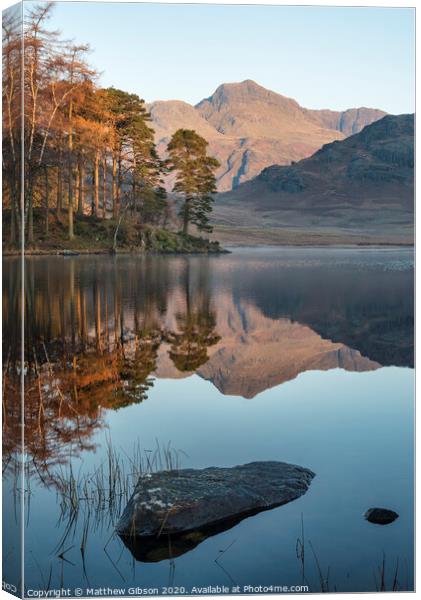 Beautiful Autumn Fall colorful sunrise over Blea Tarn in the Lake District with High Raise and The Langdales in the distance Canvas Print by Matthew Gibson