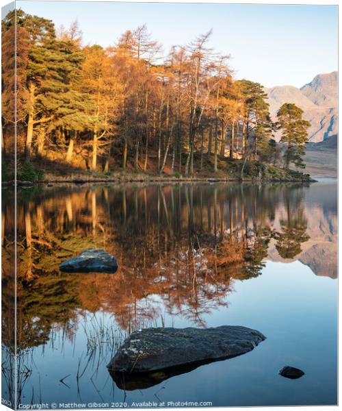 Beautiful Autumn Fall colorful sunrise over Blea Tarn in the Lake District with High Raise and The Langdales in the distance Canvas Print by Matthew Gibson