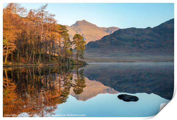 Beautiful Autumn Fall colorful sunrise over Blea Tarn in the Lake District with High Raise and The Langdales in the distance Print by Matthew Gibson