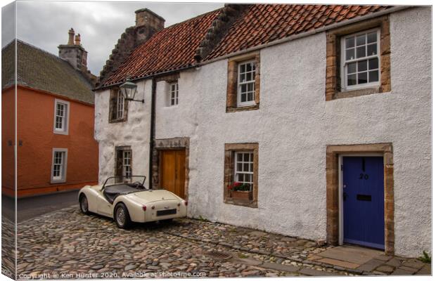The Classic Old Village and Classic Car Canvas Print by Ken Hunter