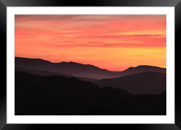 Sunset Mountain layers, The Lake District Framed Mounted Print by Dan Ward
