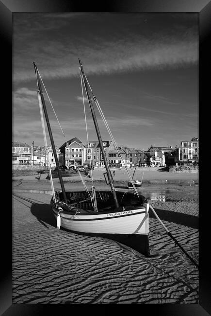 Fishing boat in St Ives harbour, Cornwall Framed Print by Dan Ward