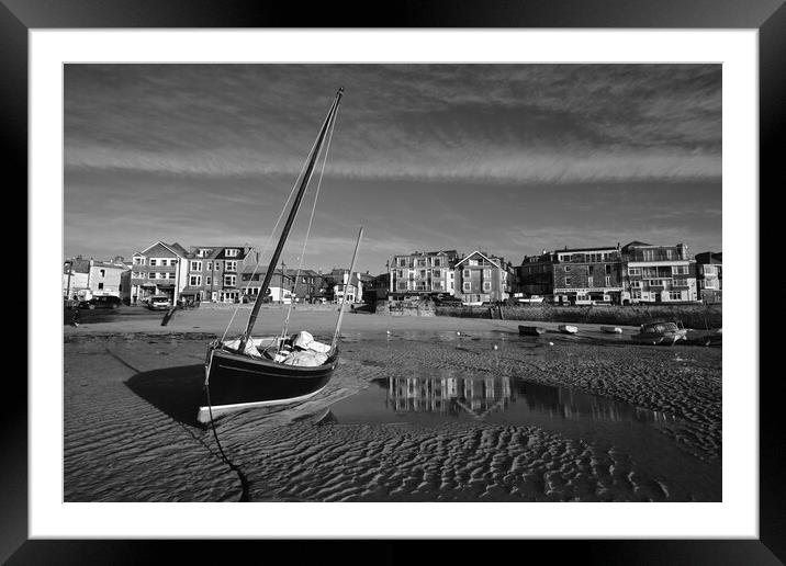 Fishing boat catching the early morning light in St Ives harbour, Cornwall Framed Mounted Print by Dan Ward