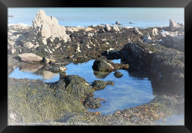 Rock Pool Reflections. Framed Print by Neil Mottershead