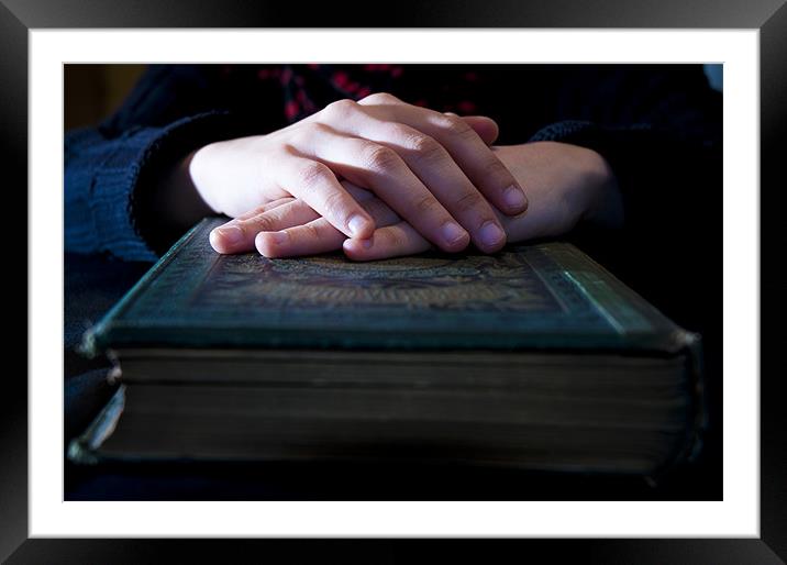 Hands on a bible Framed Mounted Print by Nathan Wright