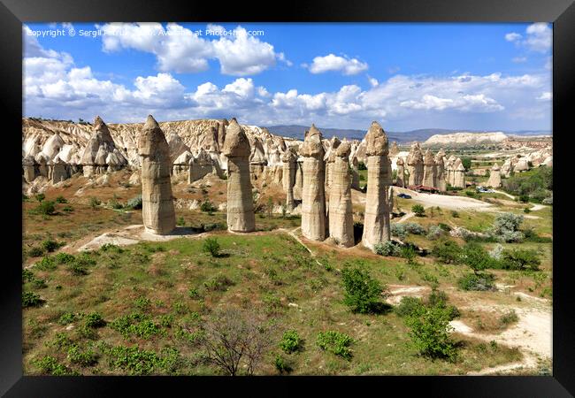 Large phallic rock formations in the Valley of Love, Cappadocia, Turkey. Framed Print by Sergii Petruk