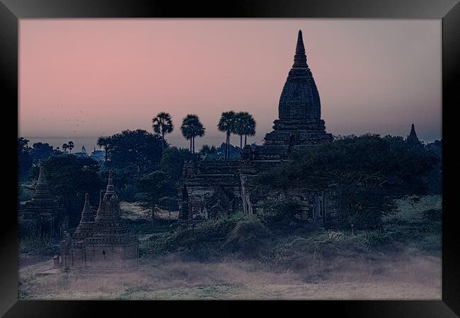 Mysterious Stupas In Bagan At Dawn Framed Print by Chris Lord