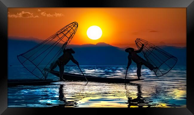Burmese Fishermen In Silhouette Against The Sunrise Framed Print by Chris Lord