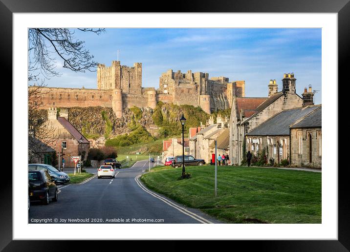 Bamburgh Castle and village, Northumberland Framed Mounted Print by Joy Newbould