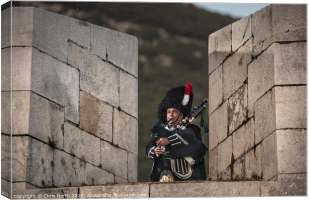 Highland Piper on the battlements of the fortress  Canvas Print by Chris North