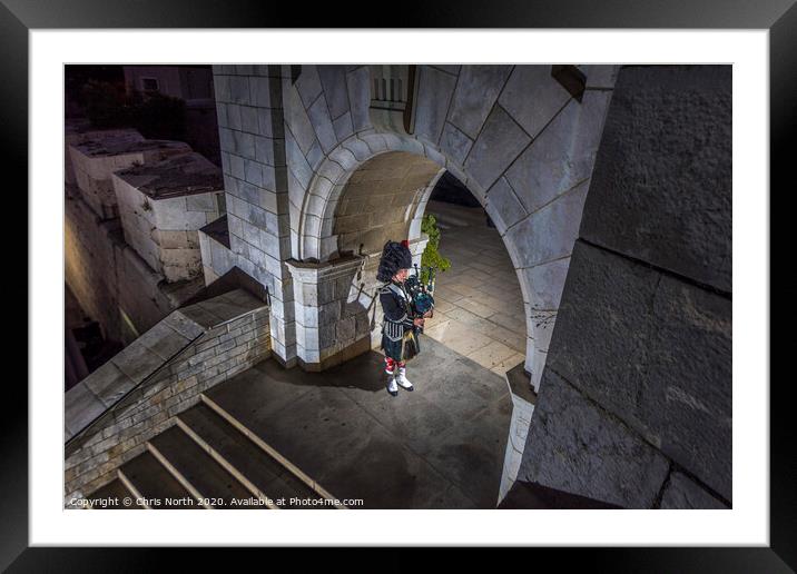 Regimental piper at the War Memorial in Gibraltar. Framed Mounted Print by Chris North