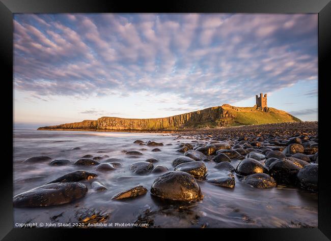 Dunstanburgh Castle clouds Framed Print by Northern Wild